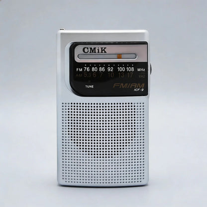 Radio Portátil Cmik Am Fm Bolsillo Pilas Aa Jack 3.5 Mini Gris