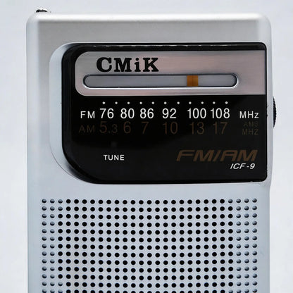 Radio Portátil Cmik Am Fm Bolsillo Pilas Aa Jack 3.5 Mini Gris
